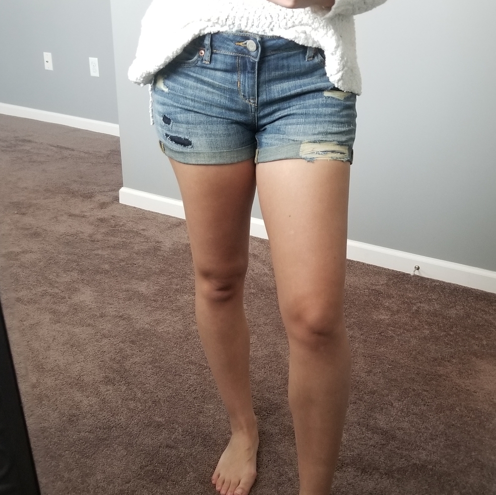 DISTRESSED DENIM SHORTS